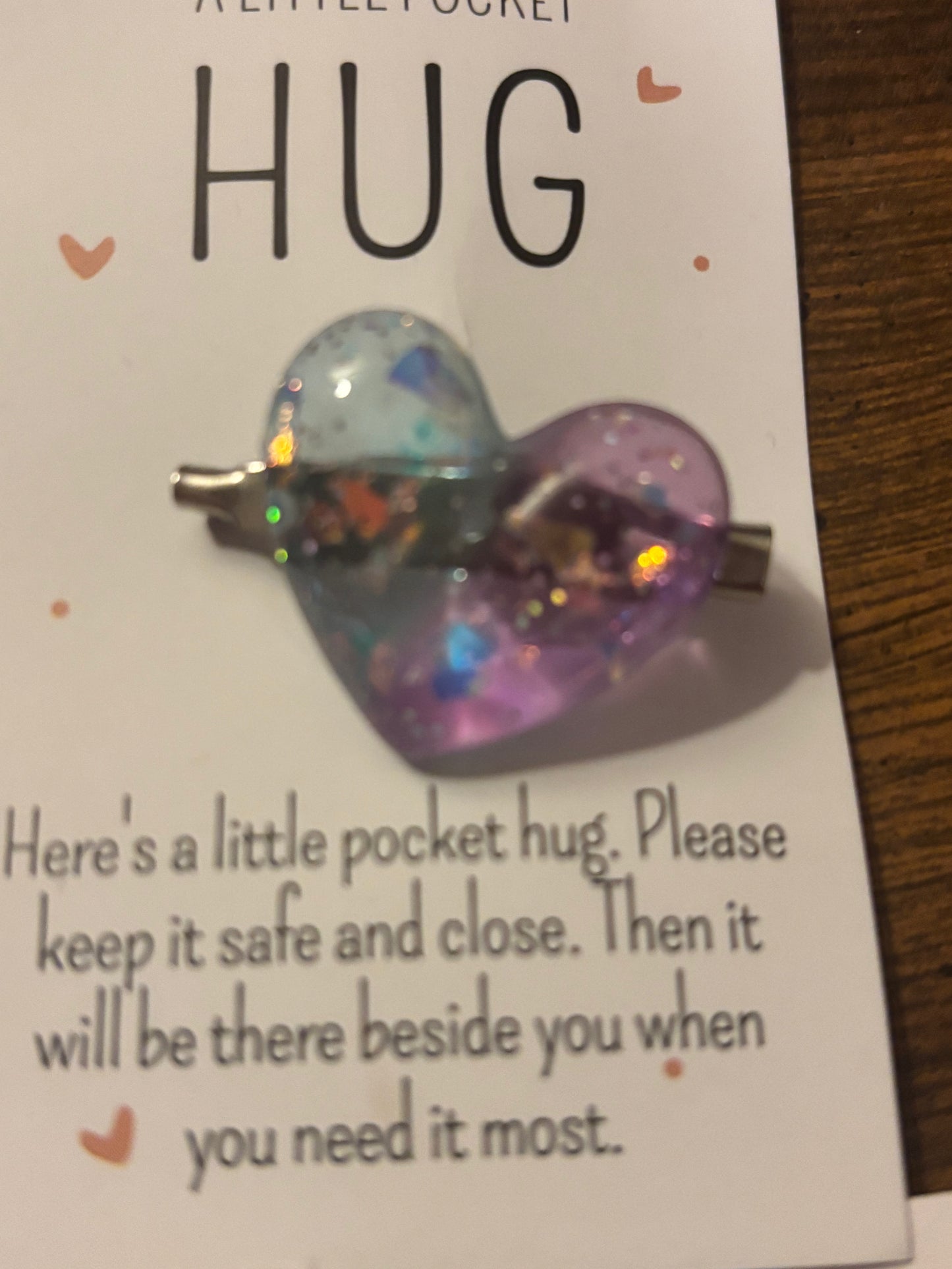 Heart hugs pin