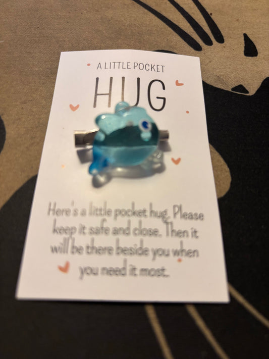 Hug fish pin