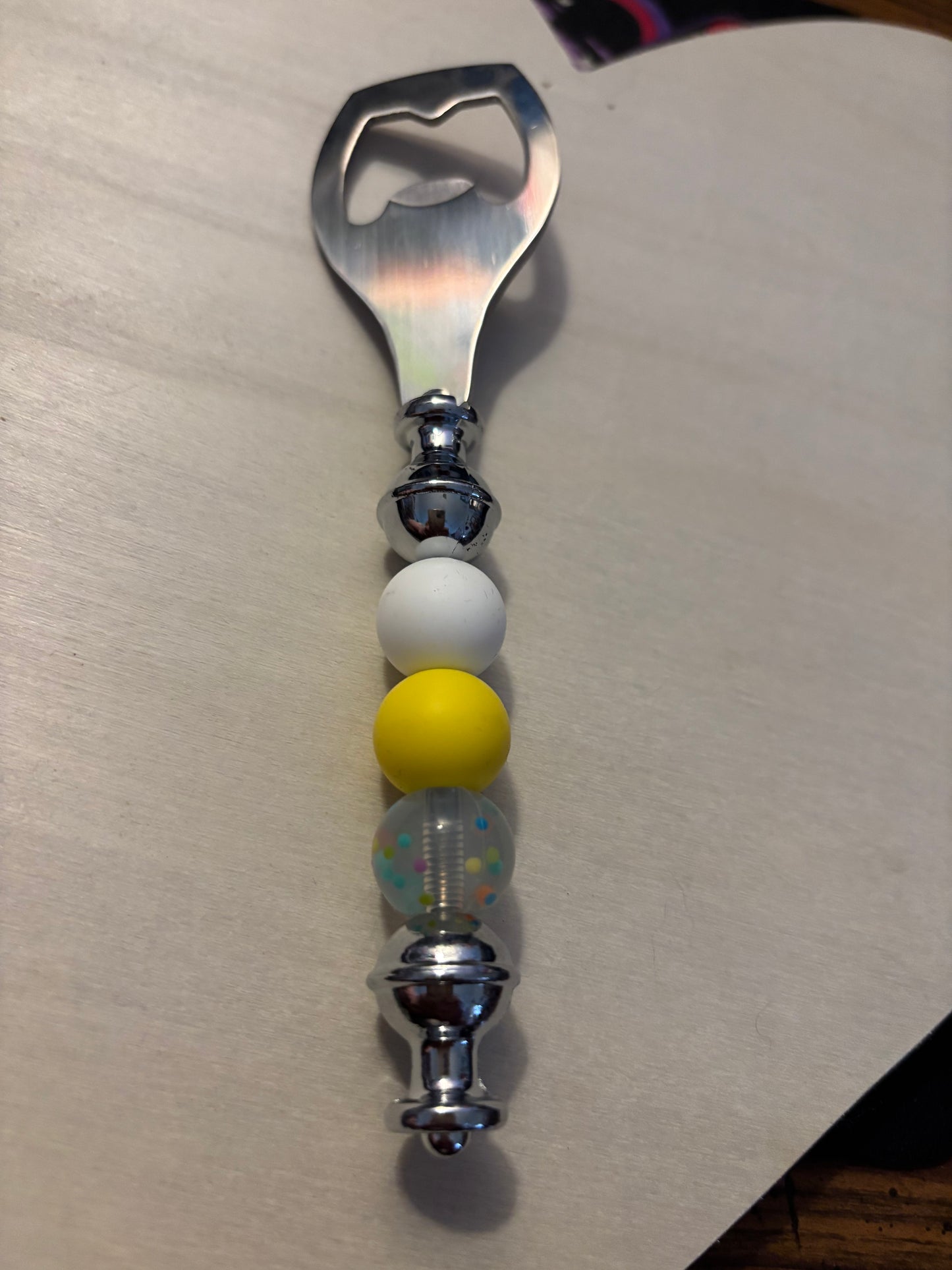 Bottle opener beaded a