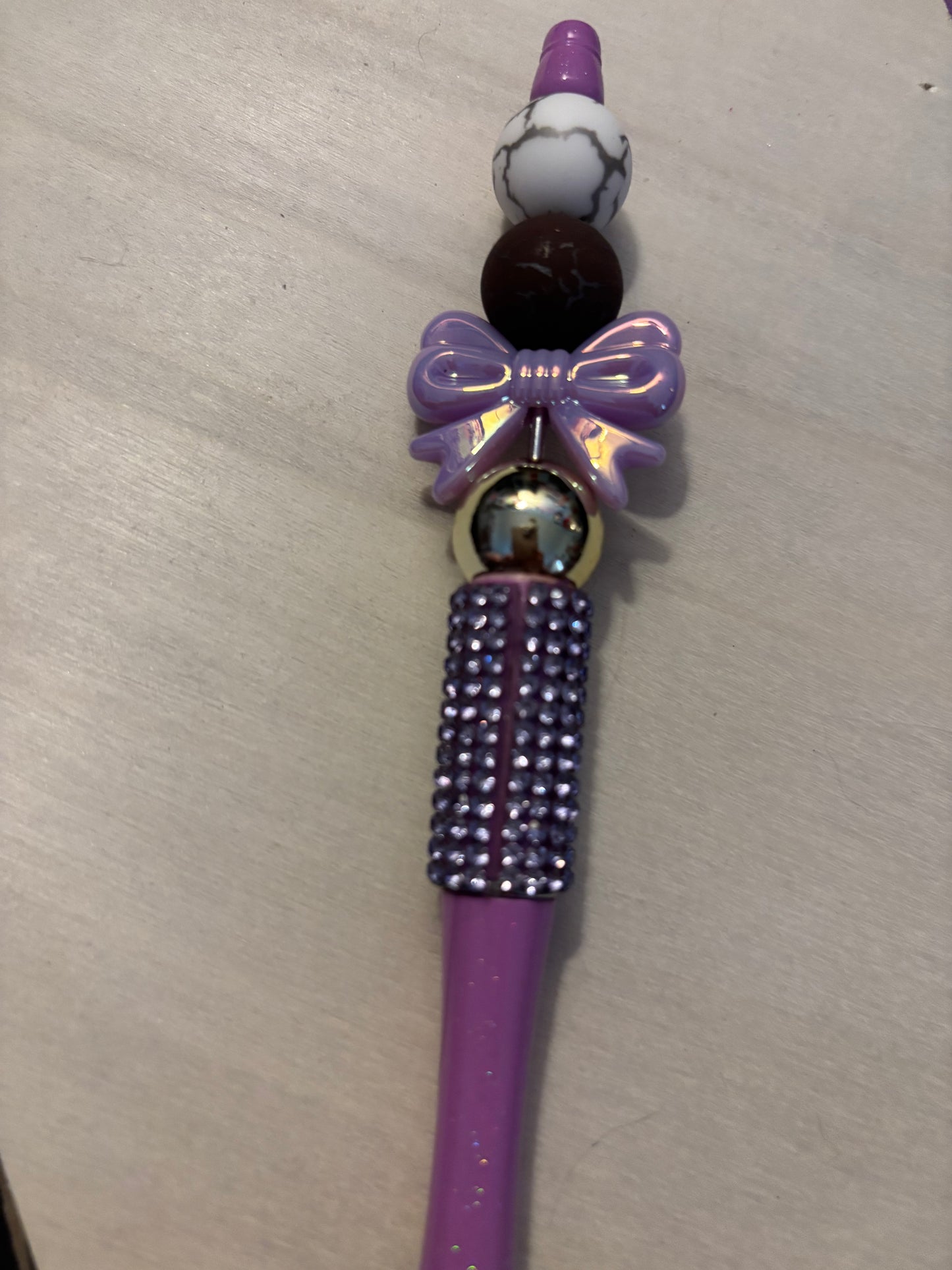 Purple bow pen