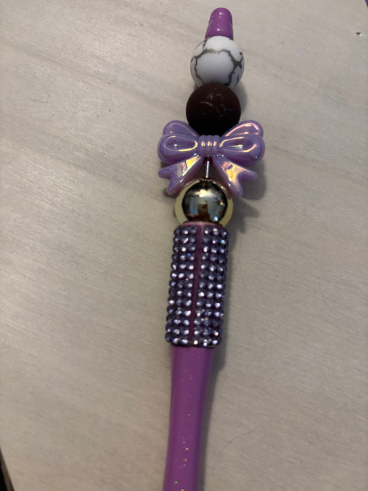Purple bow pen